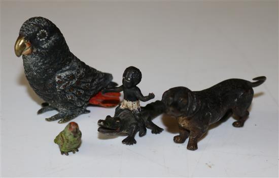 2 Austrian cold painted parrots, daschund, child riding a crocodile